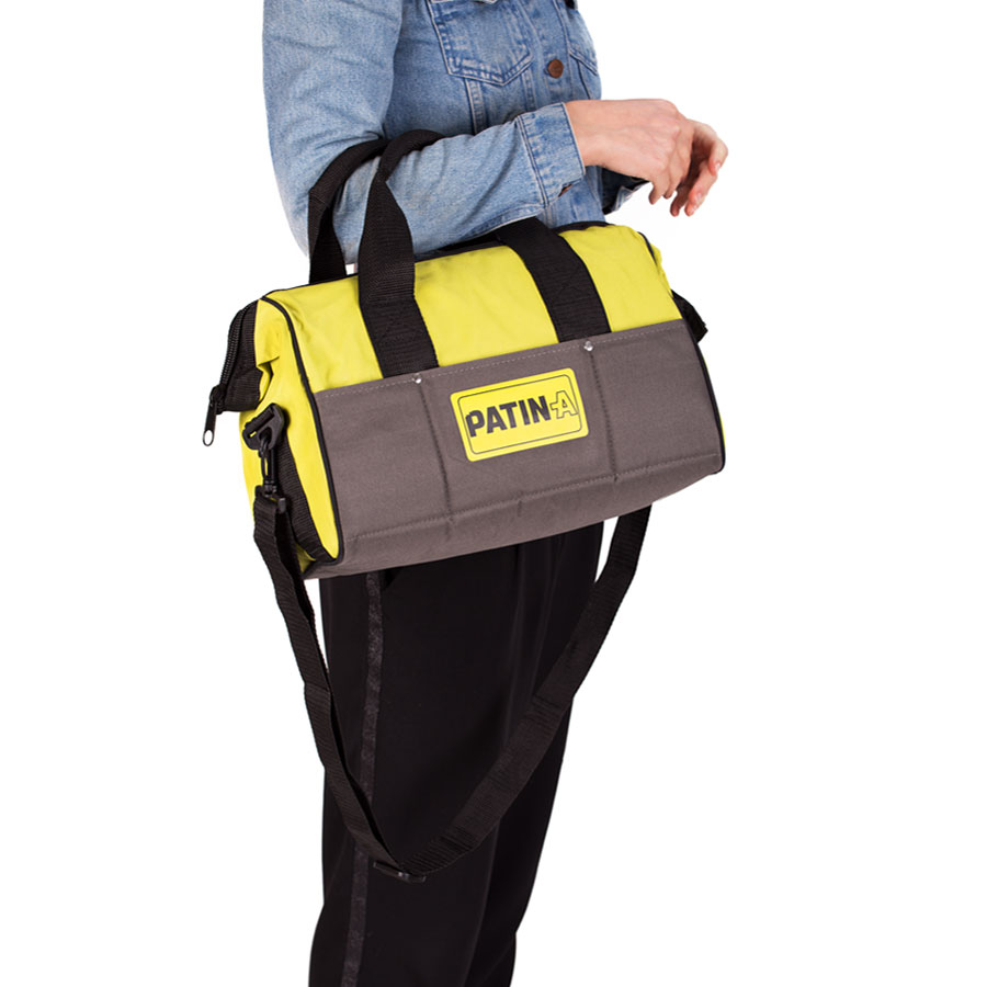 patin-a-set-tasche-in-der-hand-ii