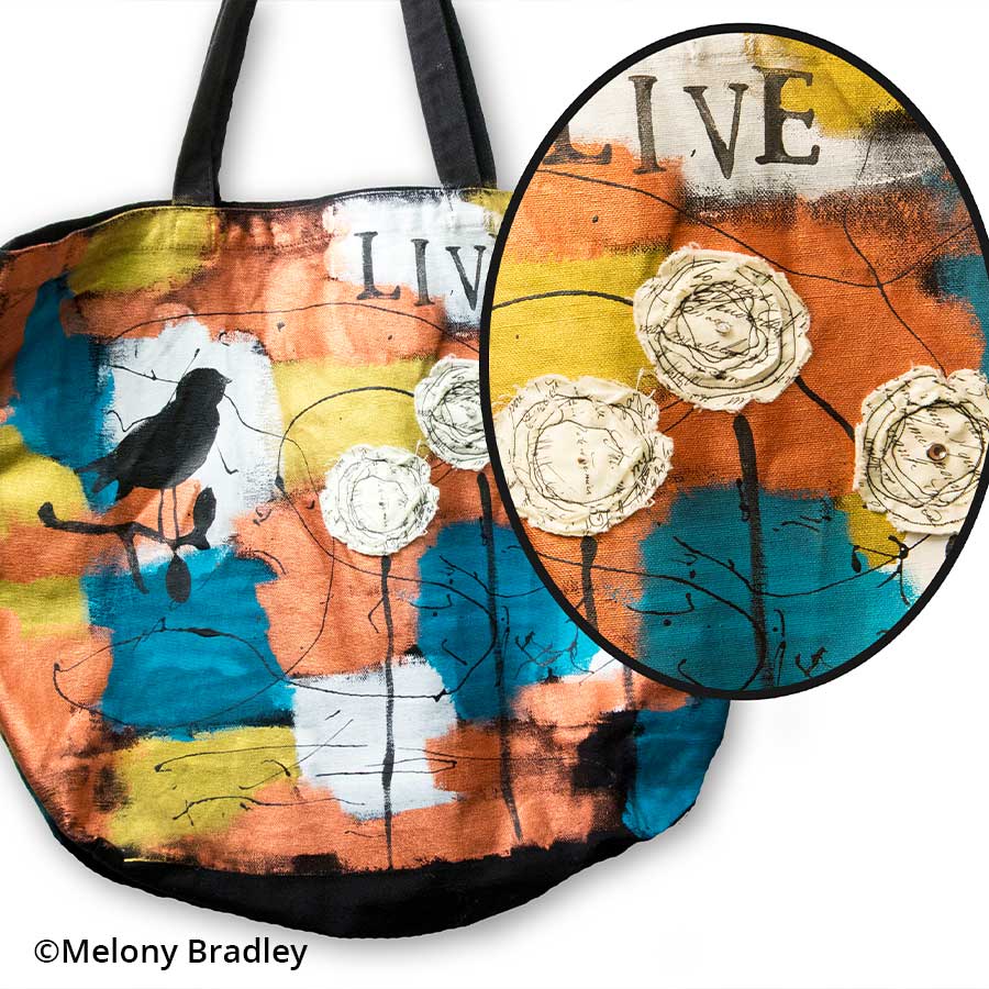 Jacquard Lumiere Metallic and Pearlescent Paint 236 ml Colourfully painted fabric bag with flowers and a bird, painted with Jacquard Lumiere